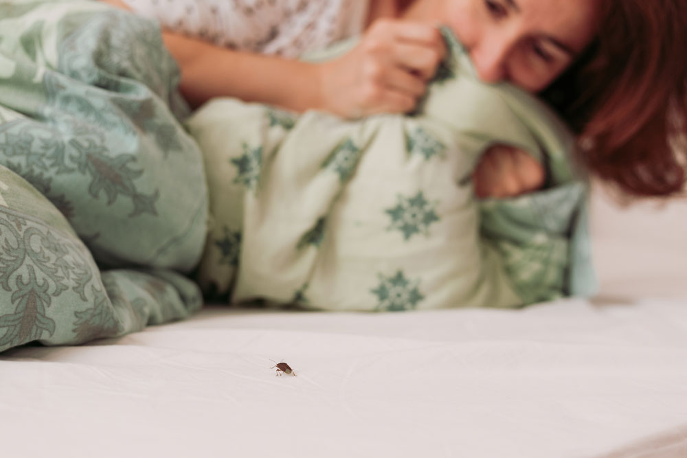Woman with bed bug